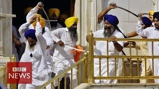 Sikh groups clash with swords at Indias Golden Temple  BBC News [upl. by Nahsez]