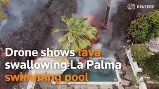 Drone shows lava swallowing La Palma swimming pool [upl. by Lexa]