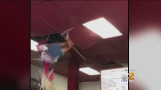 Woman Falls Through Restaurant Ceiling [upl. by Gisella547]