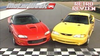 1998 Mustang Cobra Vs Camaro Z28 SS  Retro Review [upl. by Ociredef39]