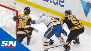 David Pastrnak amp Brad Marchand Team Up On Rasmus Dahlin For Ruthless Cross Check [upl. by Holland]